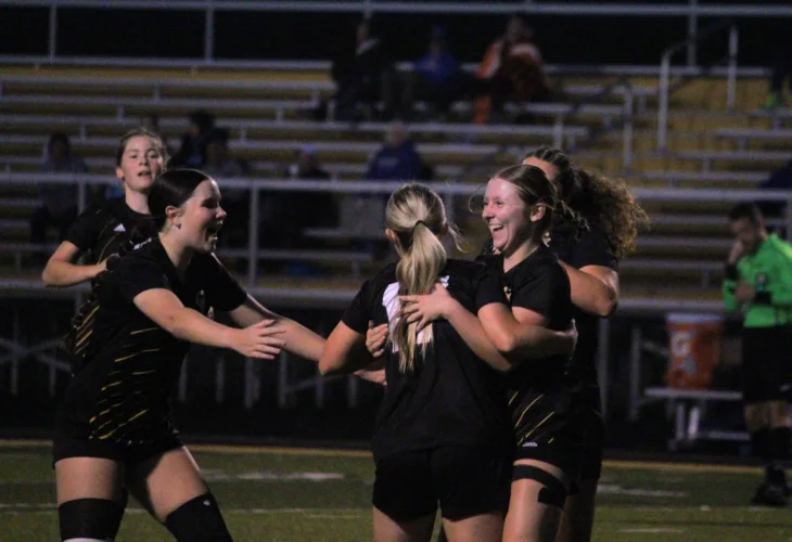 Devils defeat Rebels in playoff opener